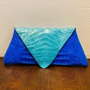 Artesian hand made leather skin bag /clutch, magnetic closure.